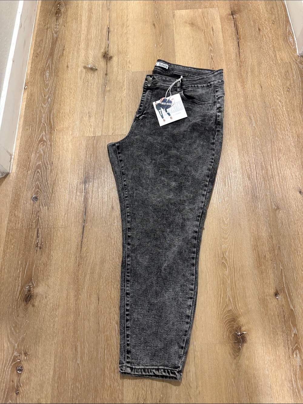 High-Rise Black Acid Wash Women’s Jeans with Tapered Leg